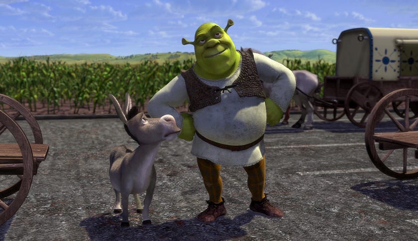 Shrek and Donkey outside Duloc in the wagon parking lot