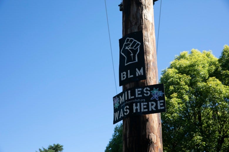 A sign honoring Miles Hall near his family’s house in Walnut Creek. Hall was killed by police during a mental health crisis last year. Photo by Anne Wernikoff for CalMatters
