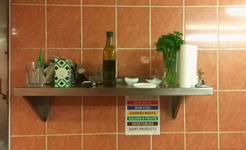 Parsley, olive oil and other ingredients on the shelf in the kitchen at Butta La Pasta, on London Road, in Sheffield