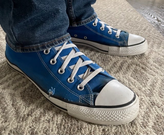 Dr. Dave's beat-up royal blue Chuck Taylors