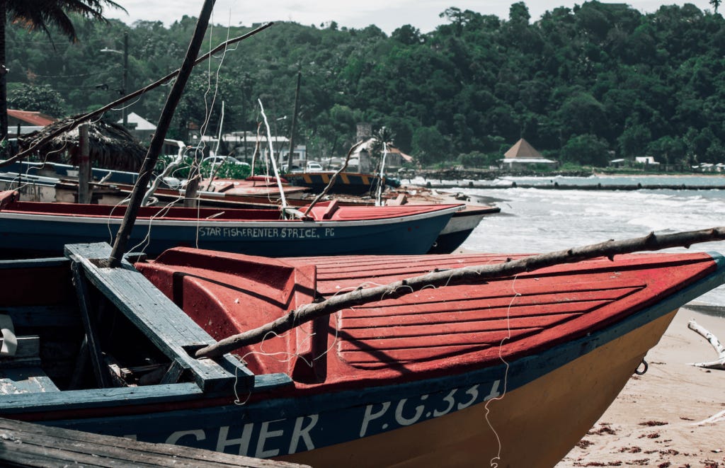 Fishing boats are parked on a coastline