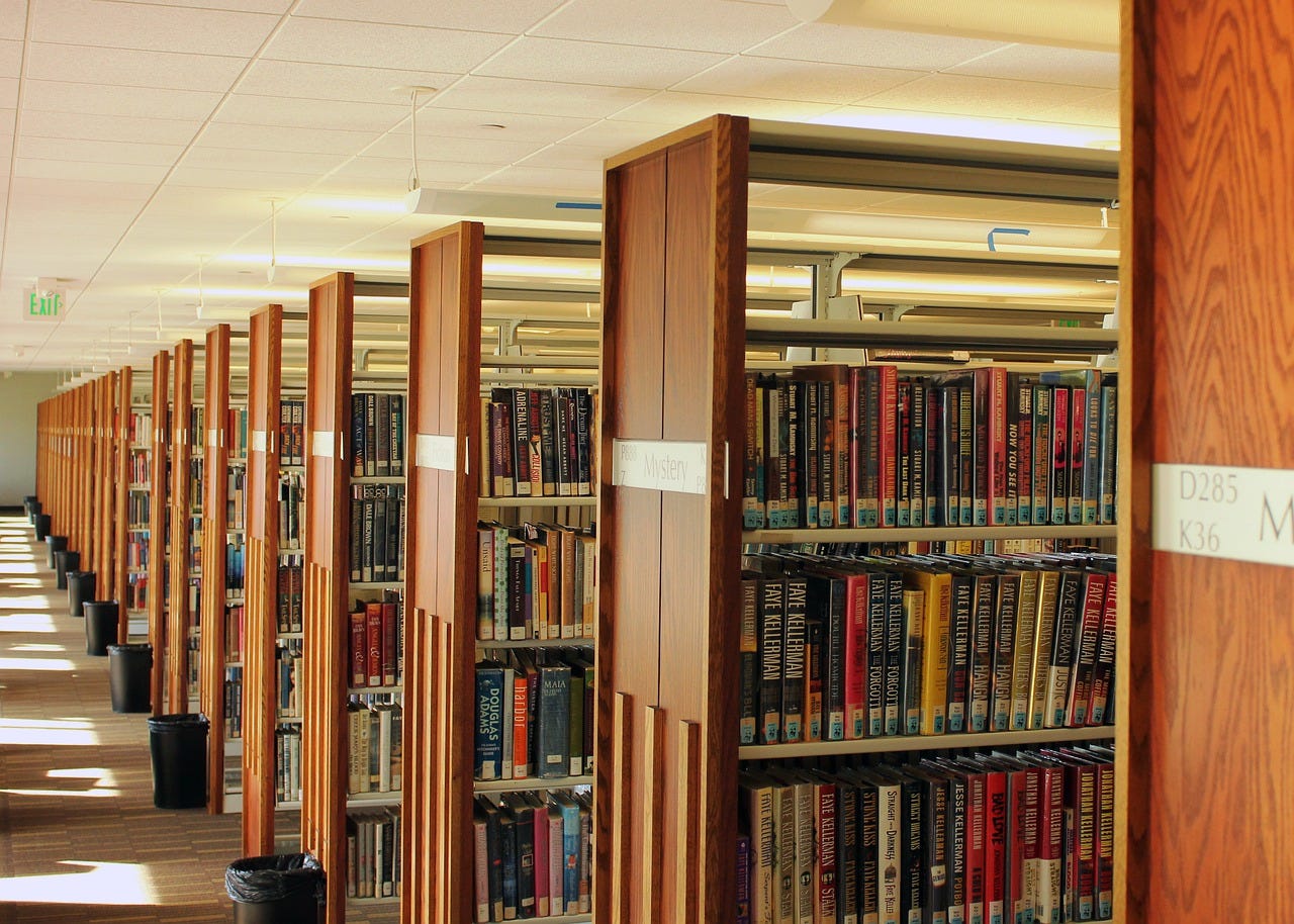 Books Library Stacks - Free photo on Pixabay