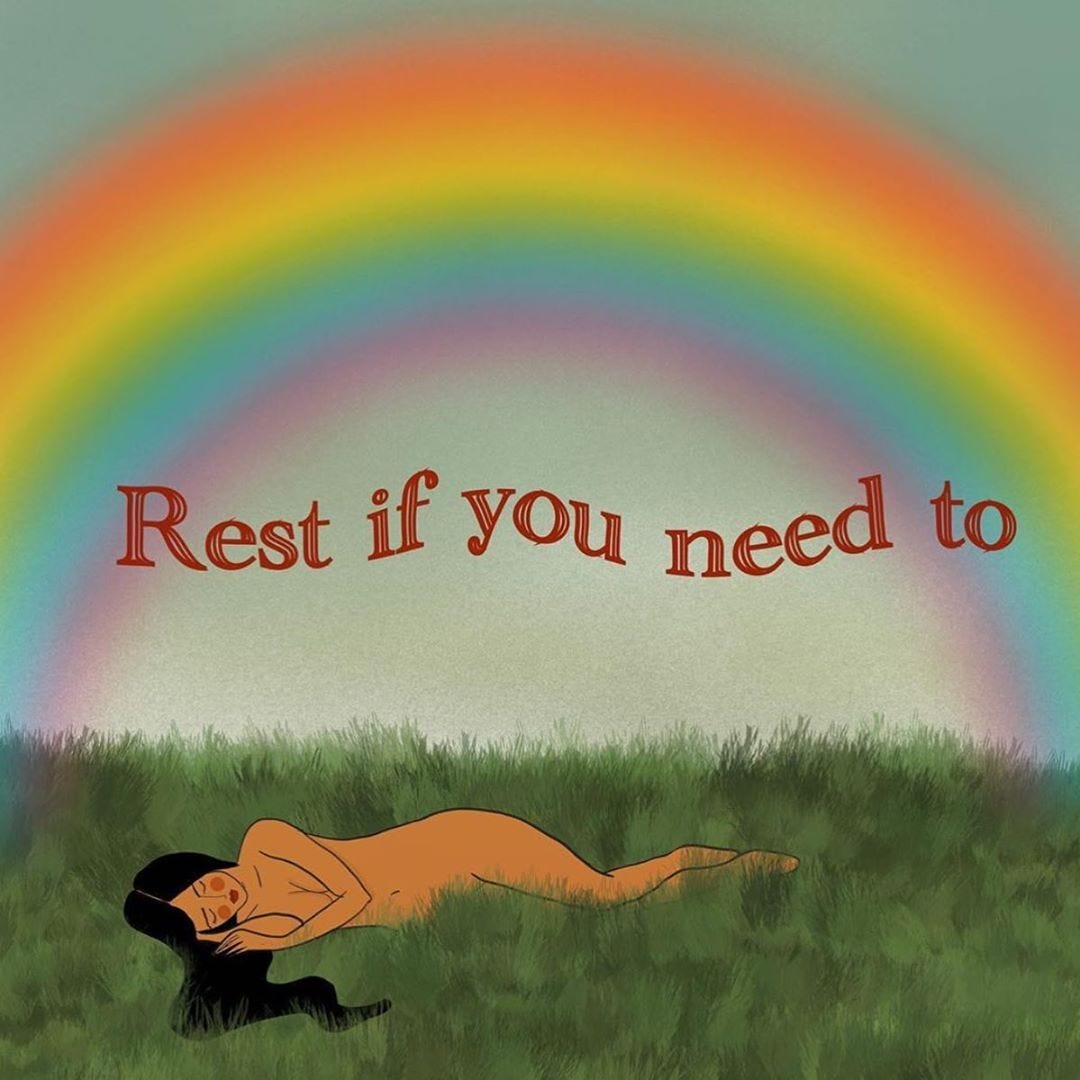 A drawing of a native woman resting peacefully beneath a rainbow, with the words Rest if you need to.