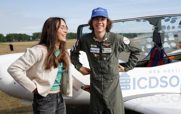Mack with his sister Zara after he landed in Pont-à-Celles, Belgium, on Tuesday. Zara Rutherford became the youngest woman to circle the globe solo last year, when she was 19.