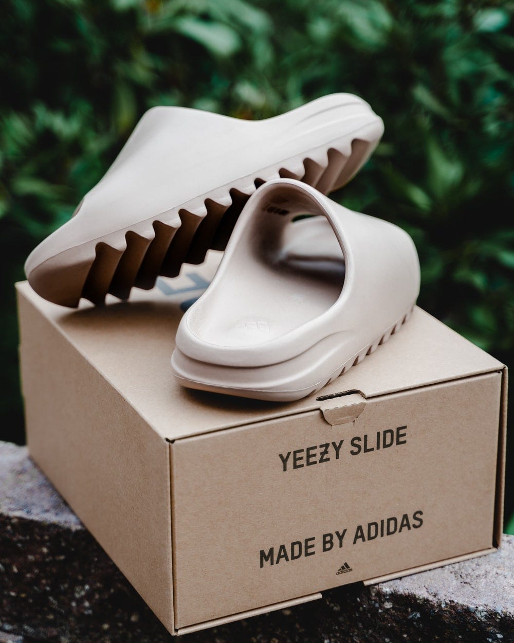 white ceramic shoe on brown cardboard box