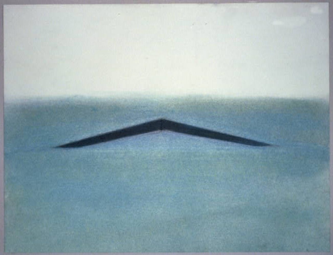 A muted blue drawing, with a triangular black sliver cut into it.