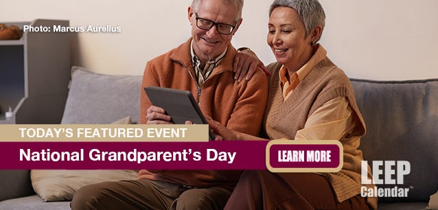 Grandparents looking at a tablet