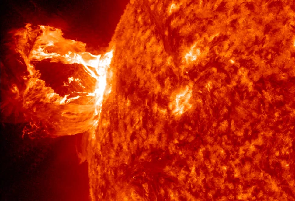 A coronal mass ejection (CME) erupts from the Sun