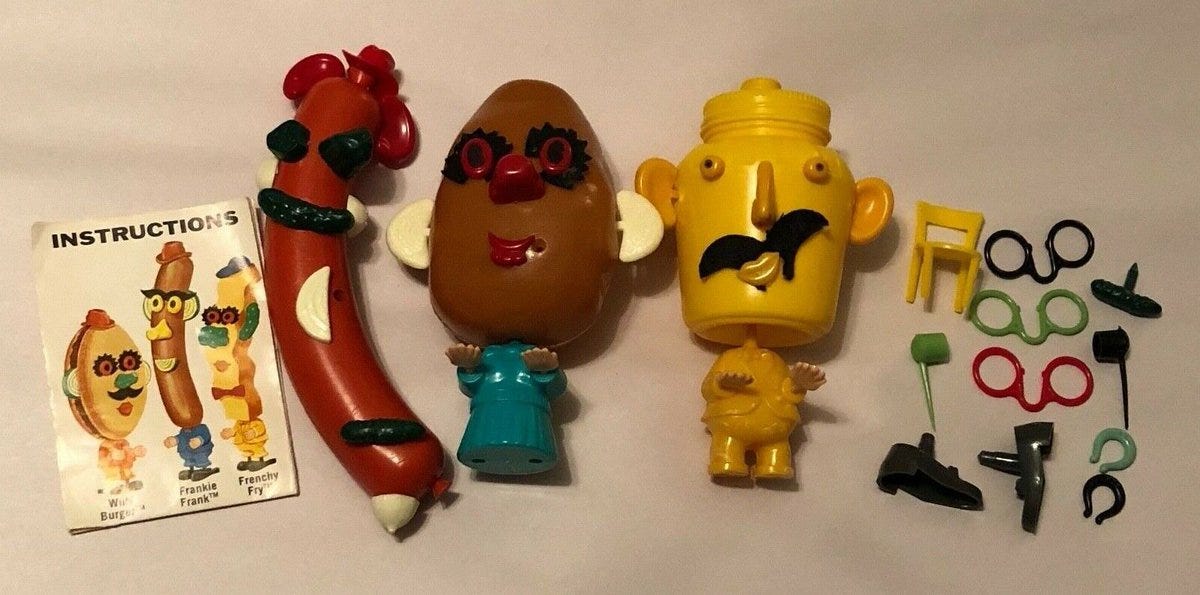 A potato, hot dog, and mustard toy set