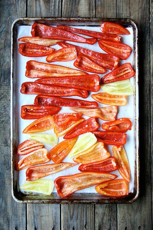 Sliced peppers on a sheet pan. 
