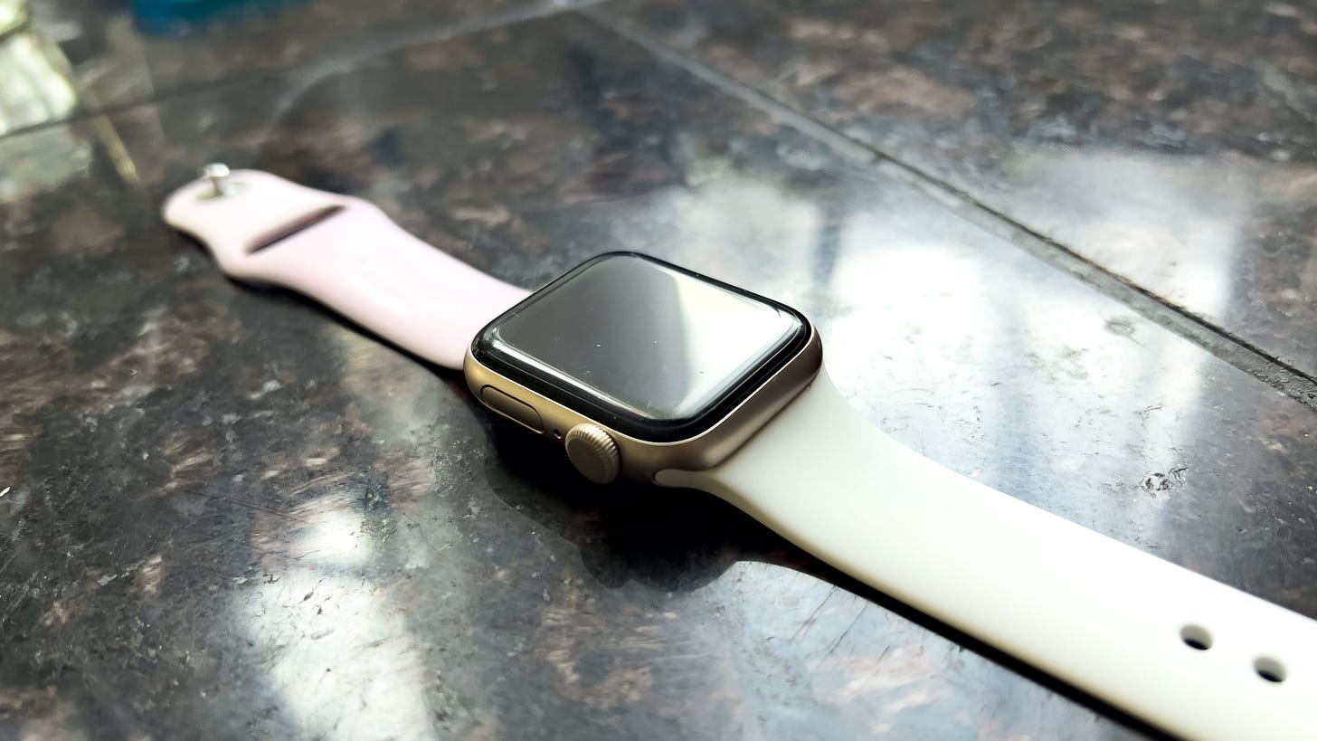 A 41mm Apple Watch SE on a granite countertop