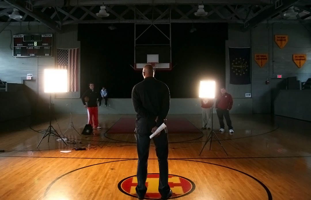 Former Indiana Pacer Clark Kellogg records a television commercial for an Indiana school at the Hoosier Gym in 2005. Kellogg is just one famous face to visit the Hoosier Gym. Over the years, a variety of VIPs have been to the gym. Among those are Larry Bird, LeBron James, Carmello Anthony and Magic Johnson. During the Bobby Knight era at IU, Knight’s son, Tim, brought basketball camps to town that featured IU standouts like Jared Jeffries, Michael Lewis, Tom Coverdale and more.