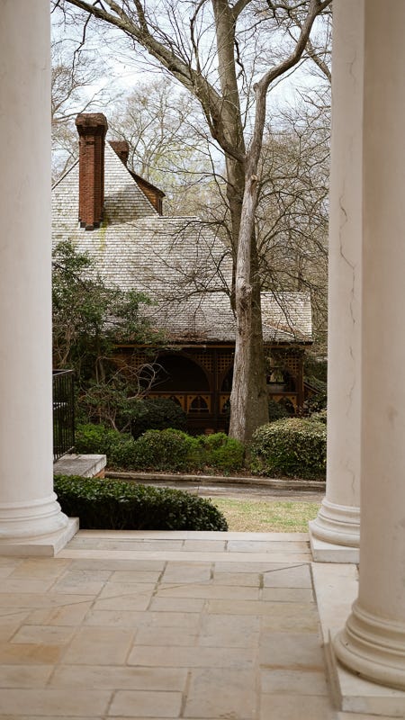 The porch of The Wren’s Nest, seen from the porch of West Hunter Street Baptist Church.