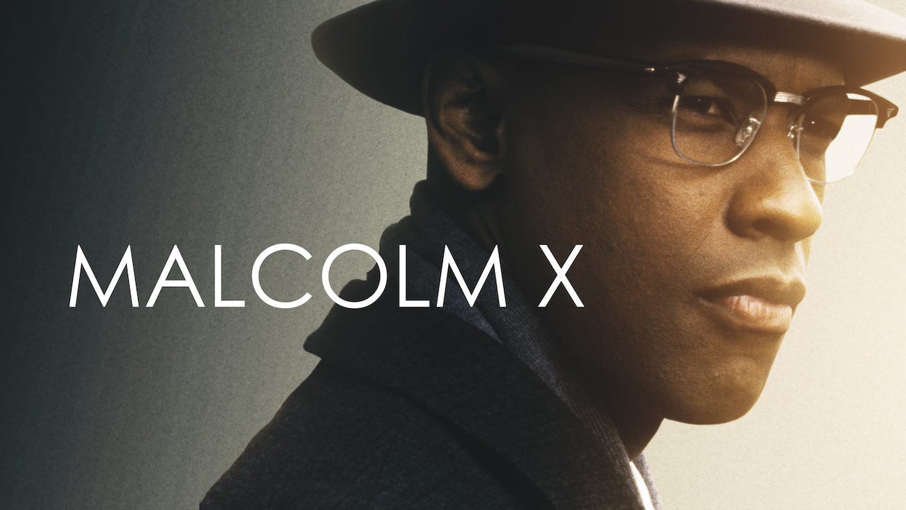 This image shows a promotional poster for Spike Lee's 1992 film Malcolm X. Denzel Washington as Malcolm X appears in a three-quarters-profile shot of his face and shoulders. The film's title ("Malcolm X") appears in white letters over Denzel's/Malcolm's right shoulder. This image shows a promotional poster for Spike Lee's 1992 film Malcolm X. Denzel Washington as Malcolm X appears in a three-quarters-profile shot of his face and shoulders. The film's title ("Malcolm X") appears in white letters over Denzel's/Malcolm's right shoulder.
