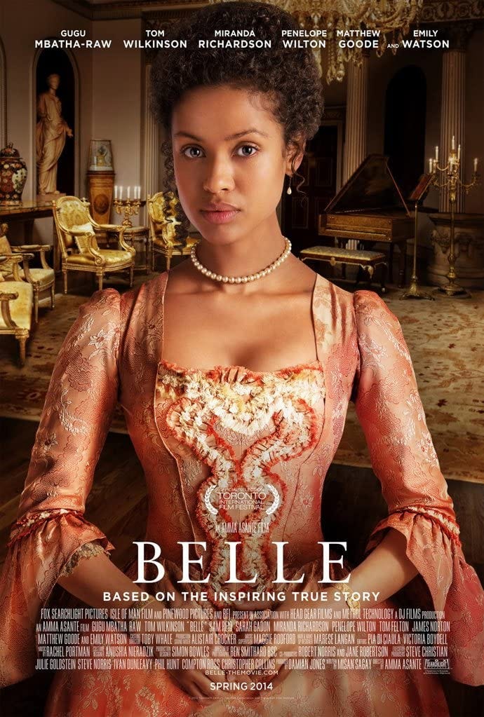 This image shows the one-sheet poster for Amma Asante's 2013 film Belle. Gugu Mbatha-Raw, playing the title character of Belle, stares at the viewer dressed in 18th-Century British finery while standing in a luxuriously appointed room. This image shows the one-sheet poster for Amma Asante's 2013 film Belle. Gugu Mbatha-Raw, playing the title character of Belle, stares at the viewer dressed in 18th-Century British finery while standing in a luxuriously appointed room.