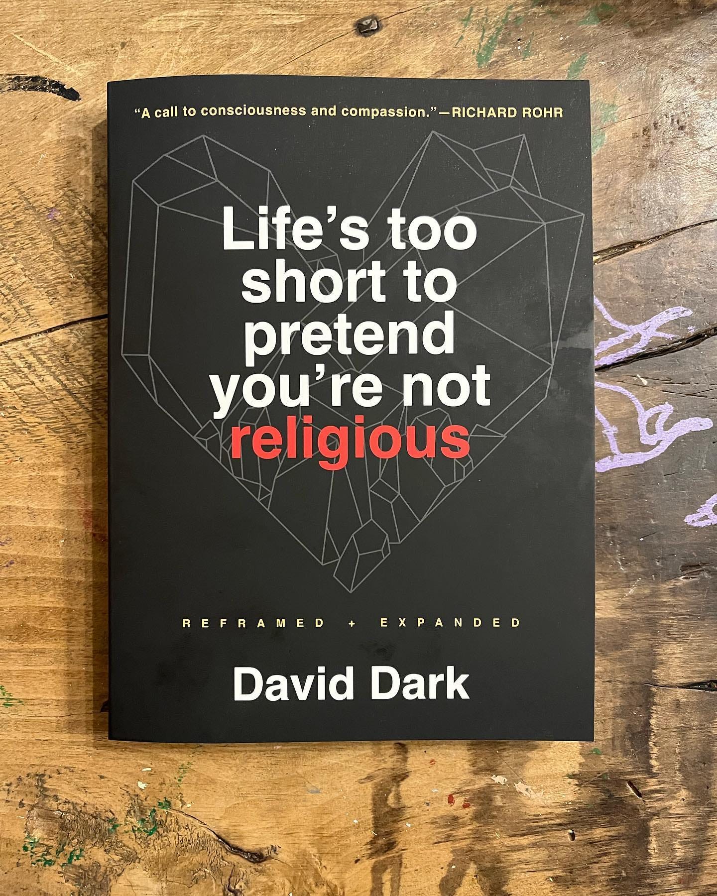 May be an image of book and text that says '"A call to consciousness and compassion." -RICHARD ROHR Life's too short to pretend you're not religious REFRAMED EXPANDED David Dark'