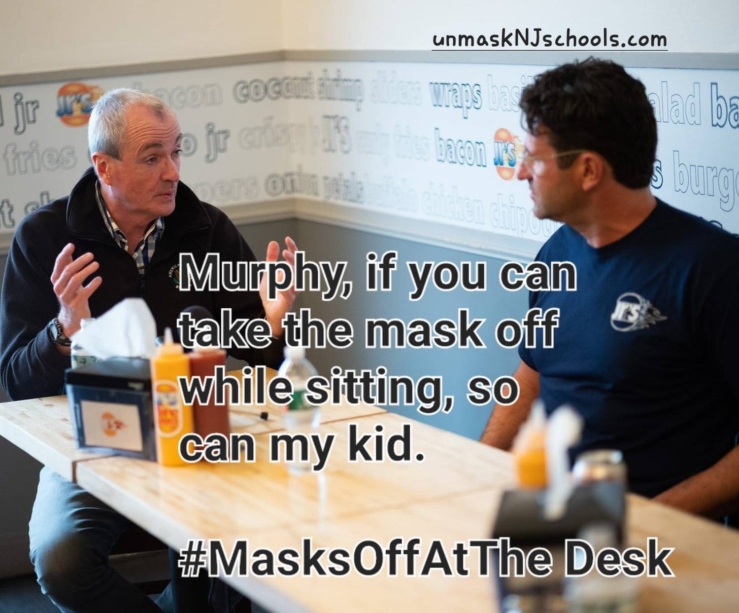 May be an image of 2 people and text that says 'jr fries unmaskNJschools.com con COCON cocomஸn jr UKS wraps bas bacon alad ba burg Murphy, if you can take the mask off while sitting, so can my kid. #MasksOffAtThe Desk'