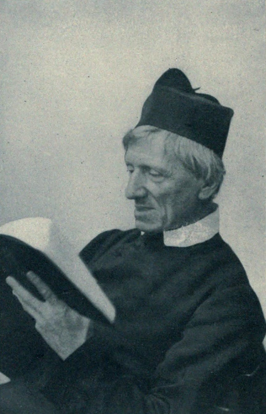 St. John Henry Newman reading a book.