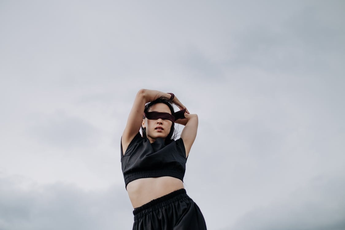 Free Woman Wearing a Crop Top and Blindfold Stock Photo