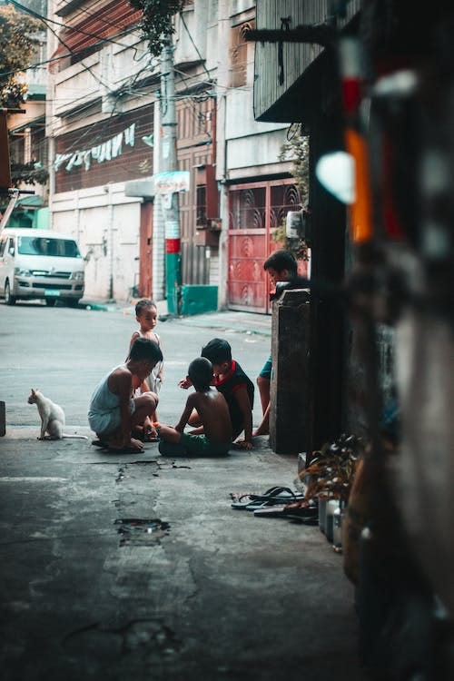 Free Group Of Kids Playing On The Streets Stock Photo