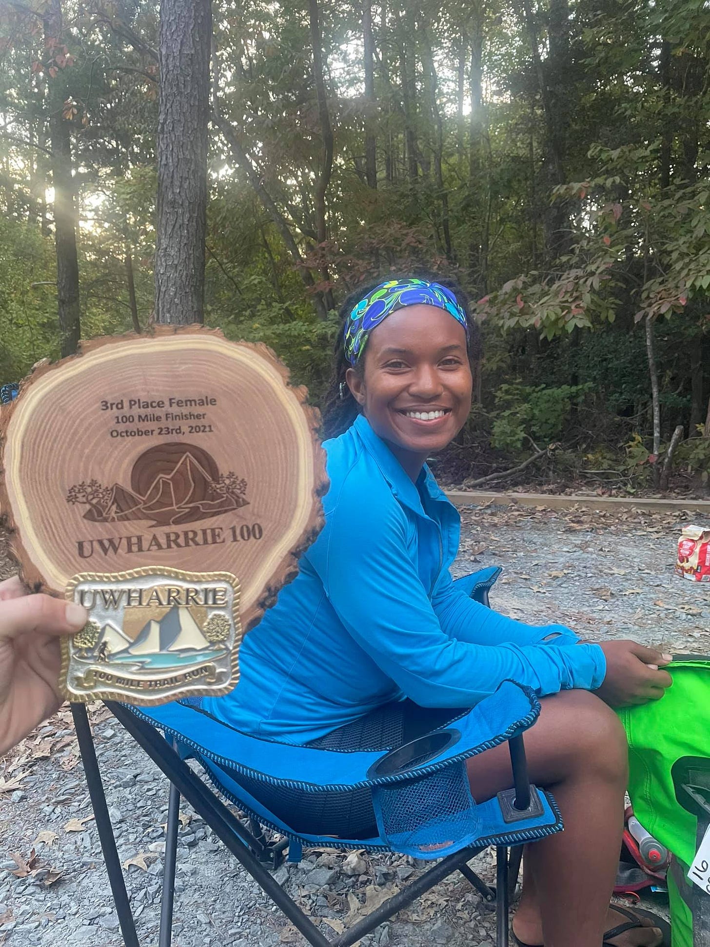 May be an image of one or more people, outdoors and text that says '3rd Place Female 100 Mile Finisher October 3rd, 2021 UWHARRIE100 UWHARRIE'