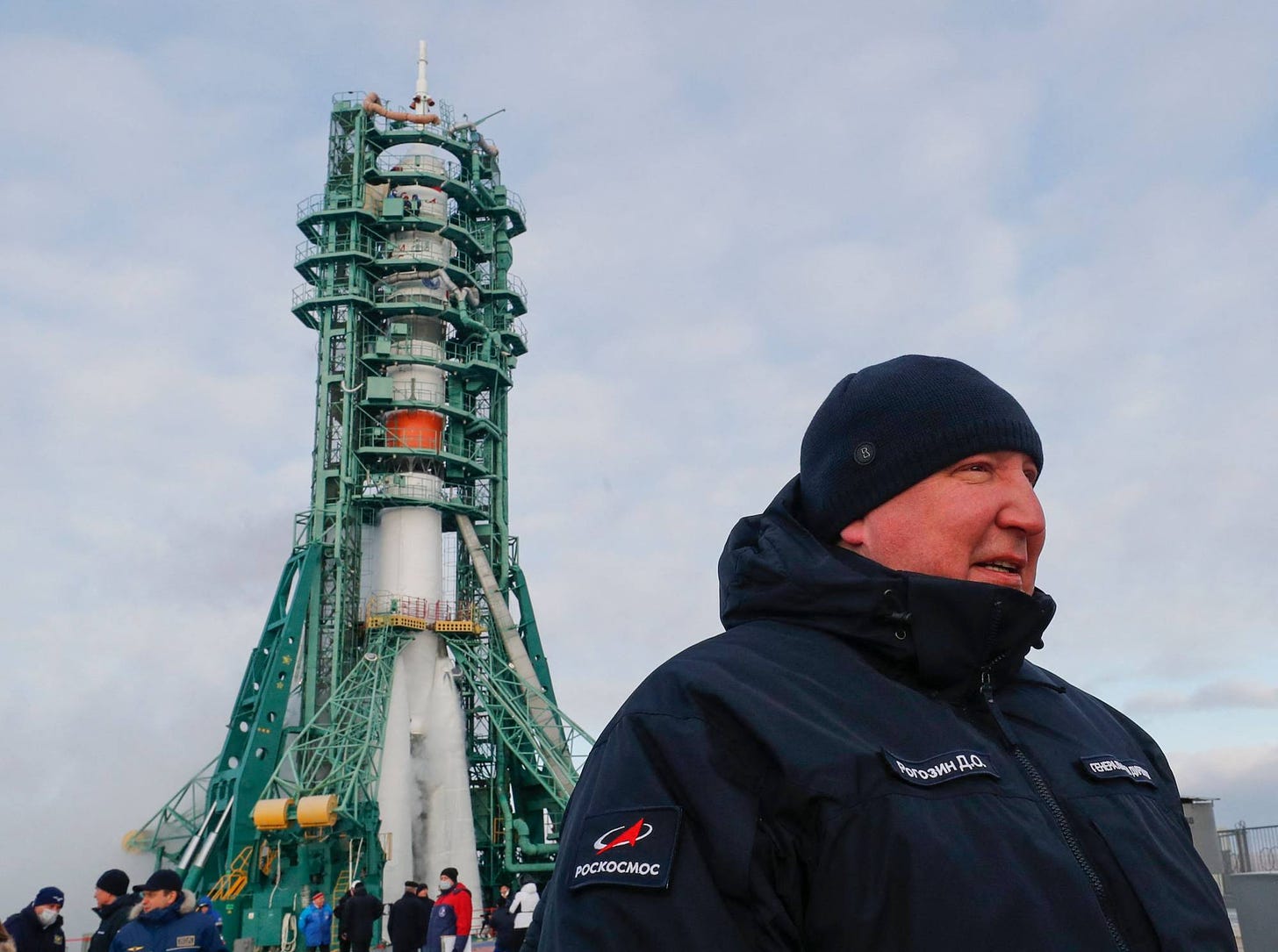 The head of Russia's Roscosmos space agency, Dmitry Rogozin, stands in front of the Soyuz MS-20 spacecraft | AFP-JIJI