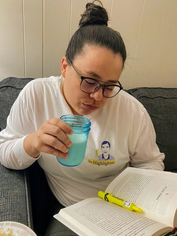 Longtime loyal reader and VIP Angelina finds that wearing her Highlighter T-shirt results in highly productive reading sessions.