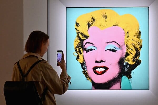 “Shot Sage Blue Marilyn,” a 1964 Andy Warhol silkscreen, was auctioned at Christie’s on Monday night.