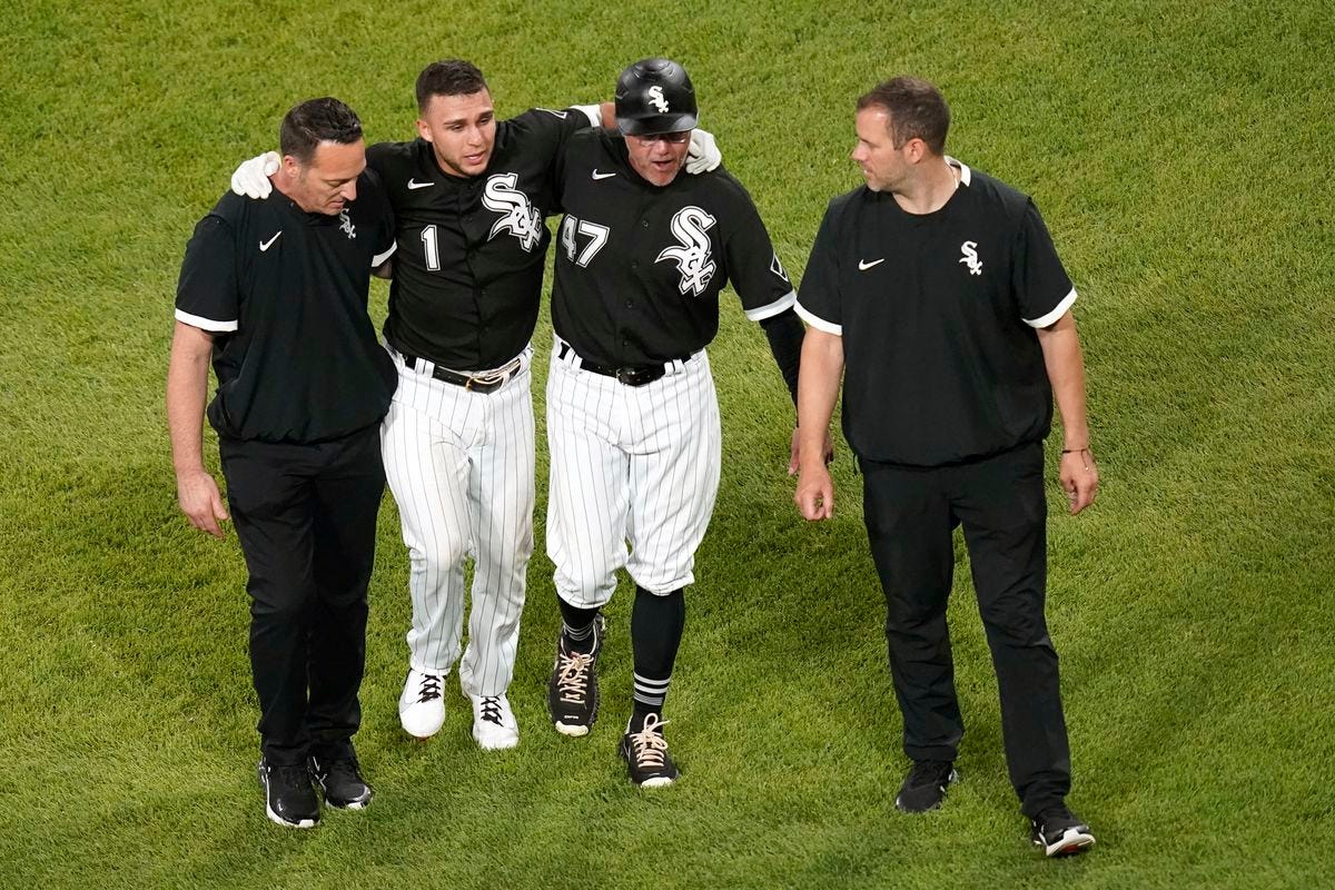 The White Sox’s Nick Madrigal (No. 1) is helped off the field during the seventh inning of Wednesday’s game. 