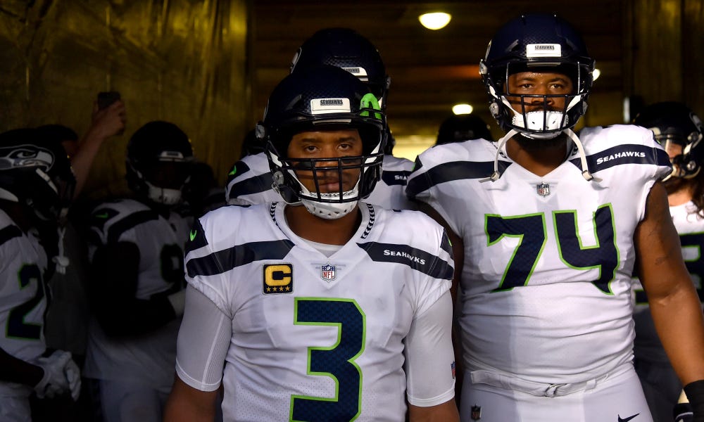 Seahawks QB Russell Wilson gifts his offensive linemen $12,000 in   stock