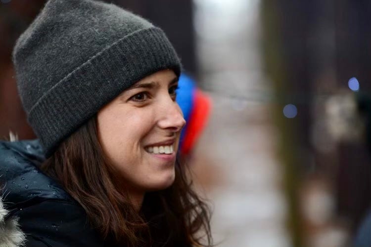 Side profile of smiling woman