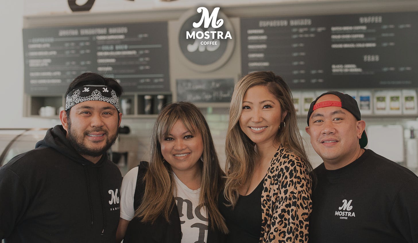 The owners of Mostra Coffee in front of their menu board. From left Sam, Bev, Jelynn and Mike.