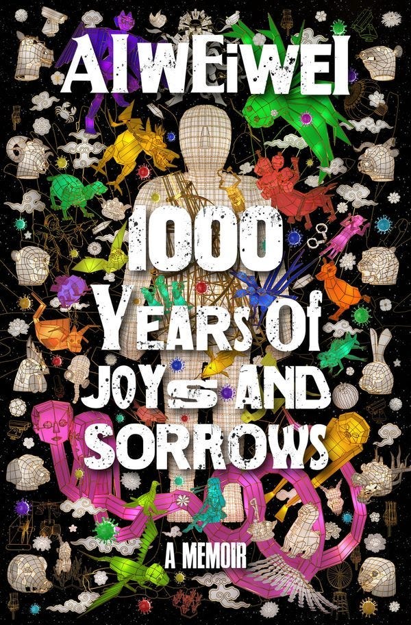 Full colour image of the book's cover. A black background featuring brightly coloured drawings with the book's title and author's name set in a bold, white font.