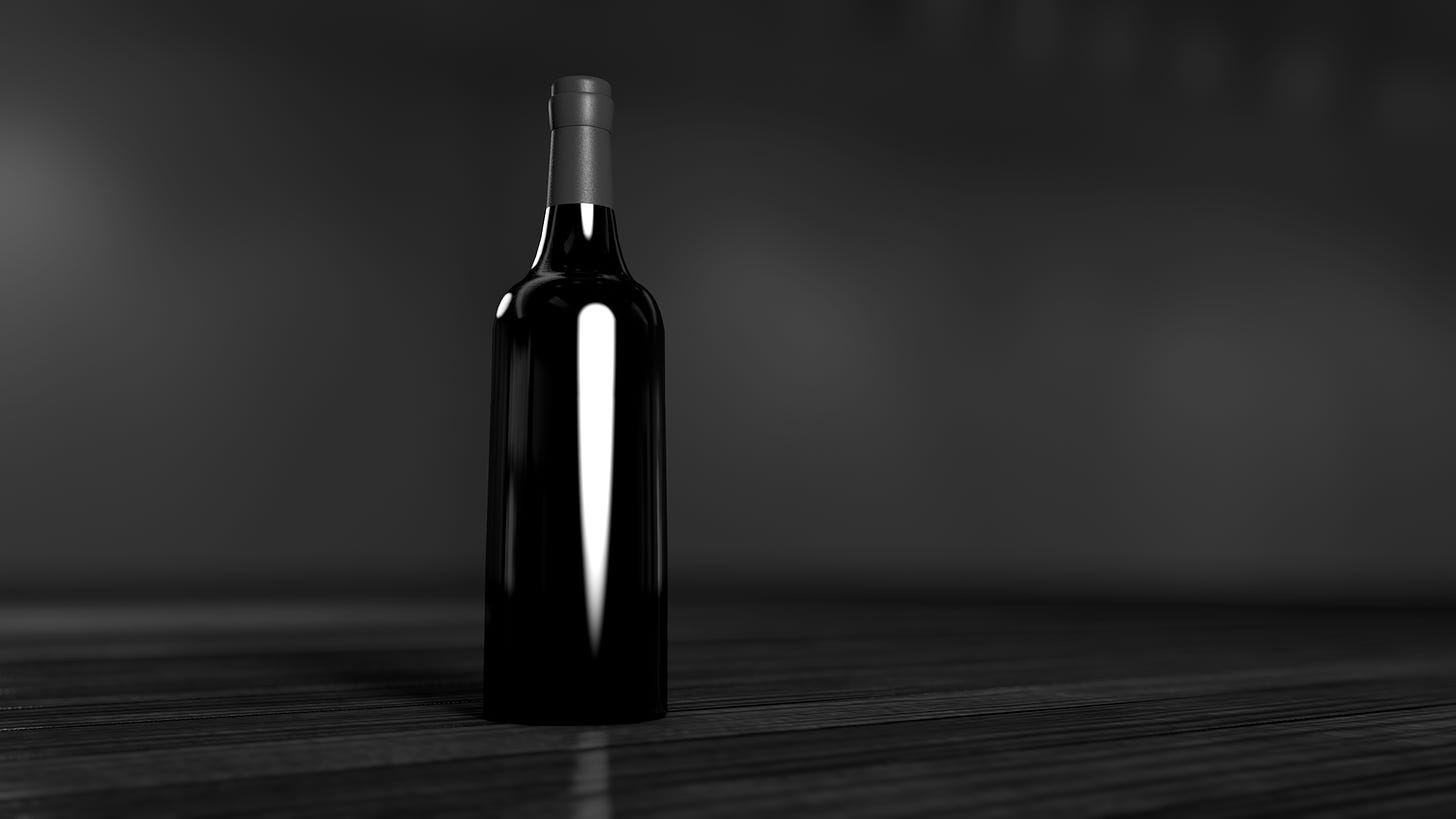 A wine bottle with no label and a strip of reflected light.