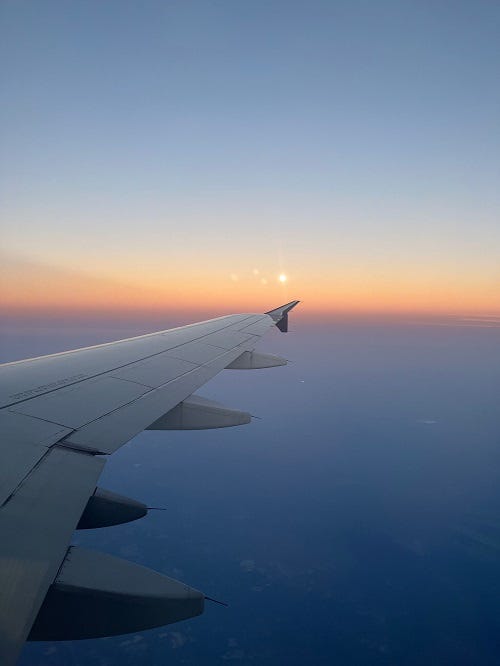 plane wing & sunset