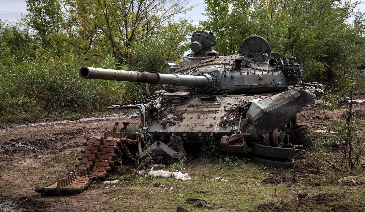 A destroyed Russian tank in the town of Izium, recently liberated by Ukrainian Armed Forces, in Kharkiv Region, Ukraine, September 20, 2022.   