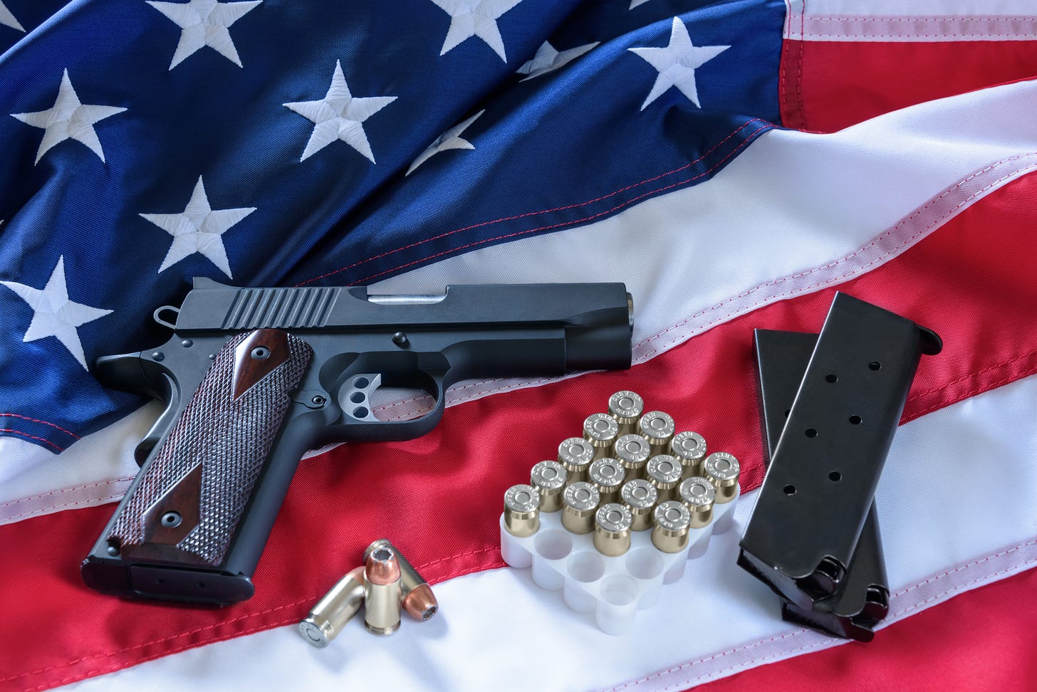 The second amendment and gun control in the US, concept. A handgun ...