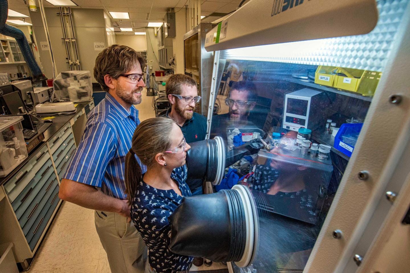Sandia Labs scientists work on a new molten salt battery