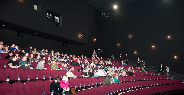 The audience prepares for Mission Impossible: Ghost Protocol