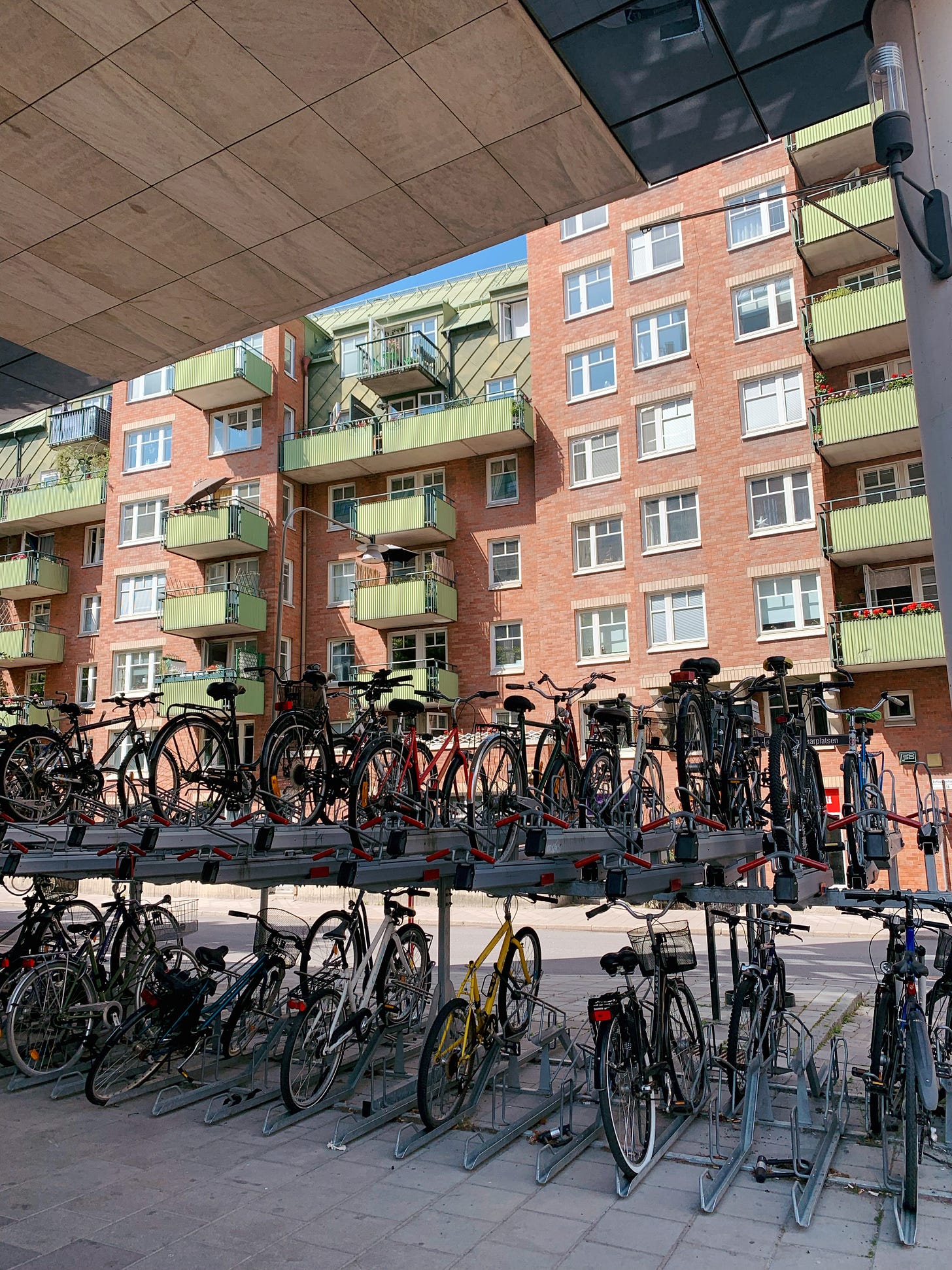Bike rack with tons of bikes on it