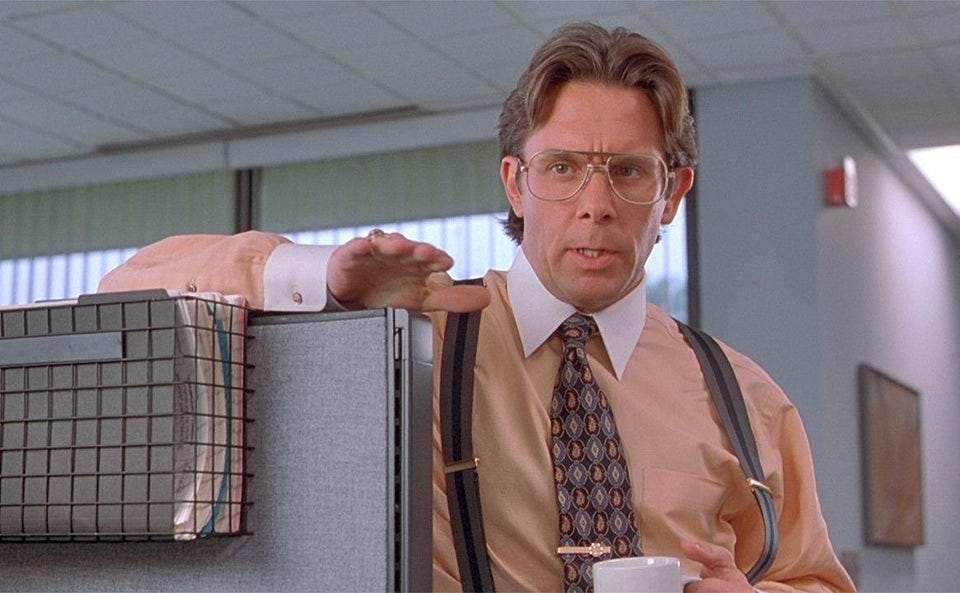 r/shittymoviedetails - In Office Space (1999), Bill Lumbergh subtly nods and gestures his hand towards a memo on the desk, indicating that he would like Peter to begin putting the new cover sheets on the TPS Reports.