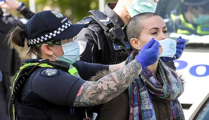 Lockdown protesters defy police in Australia | Cyprus Mail