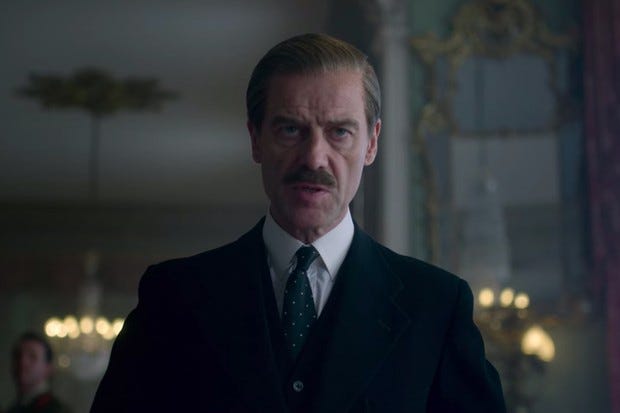 A still of Tommy Lascelles (Pip Torrens) from the Crown