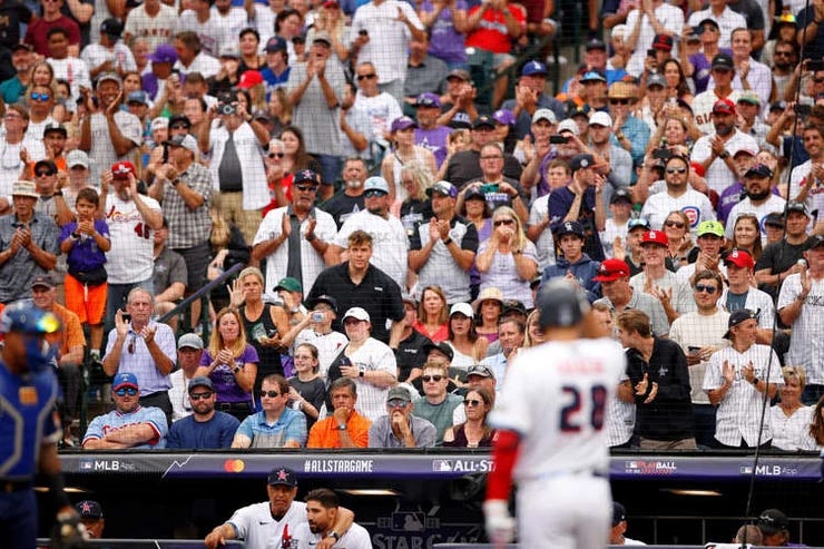 Nolan Arenado receives an ovation from the Denver crowd before his first at-bat.