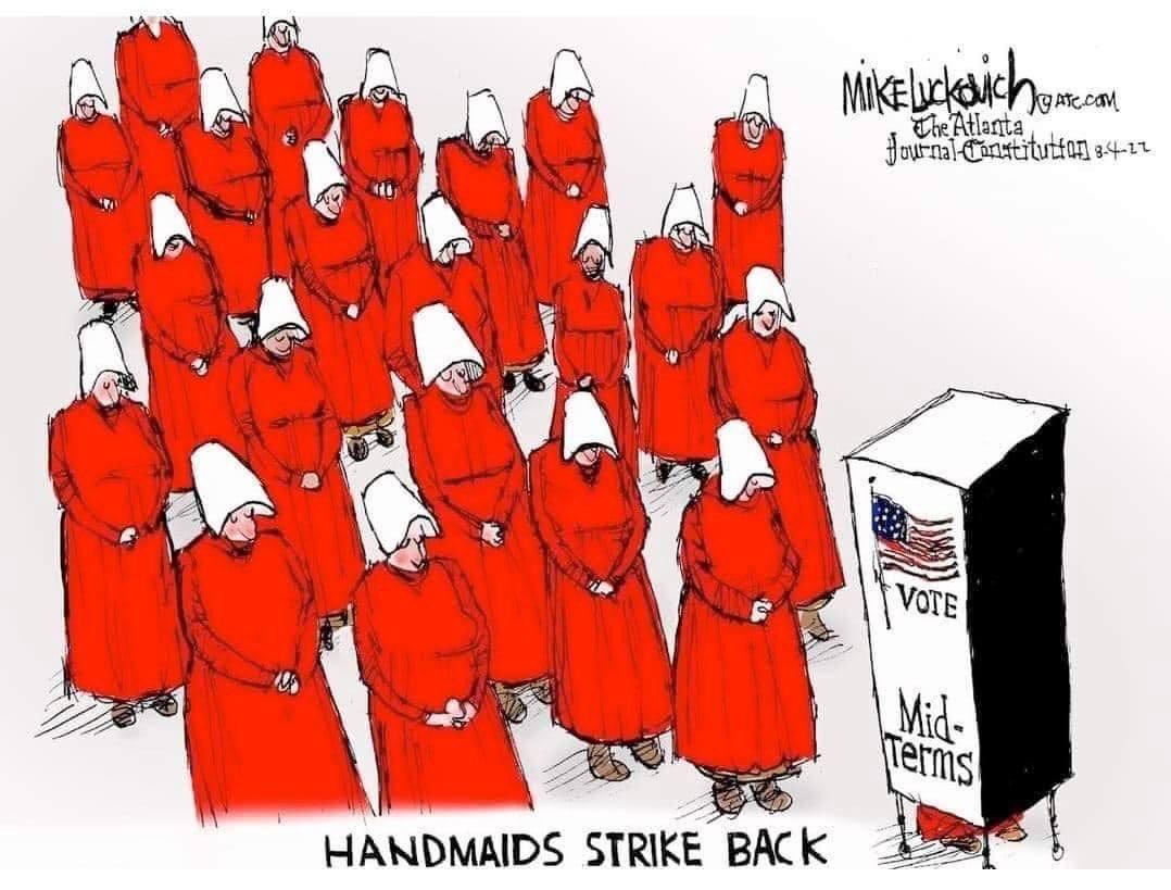 Cartoon depicting a group of women dressed in red robes and white caps, like those in the handmaiden tales, approaching a ballot box that reads 'vote midterms'. Cartoon by Mike Lukovich, Atlanta Journal Consitution.