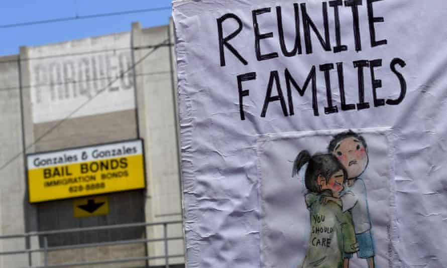 Signs during a march and rally against the separation of immigrant families on 30 June 2018 outside the detention facility of the Immigration and Customs Enforcement (Ice) in Los Angeles, California.