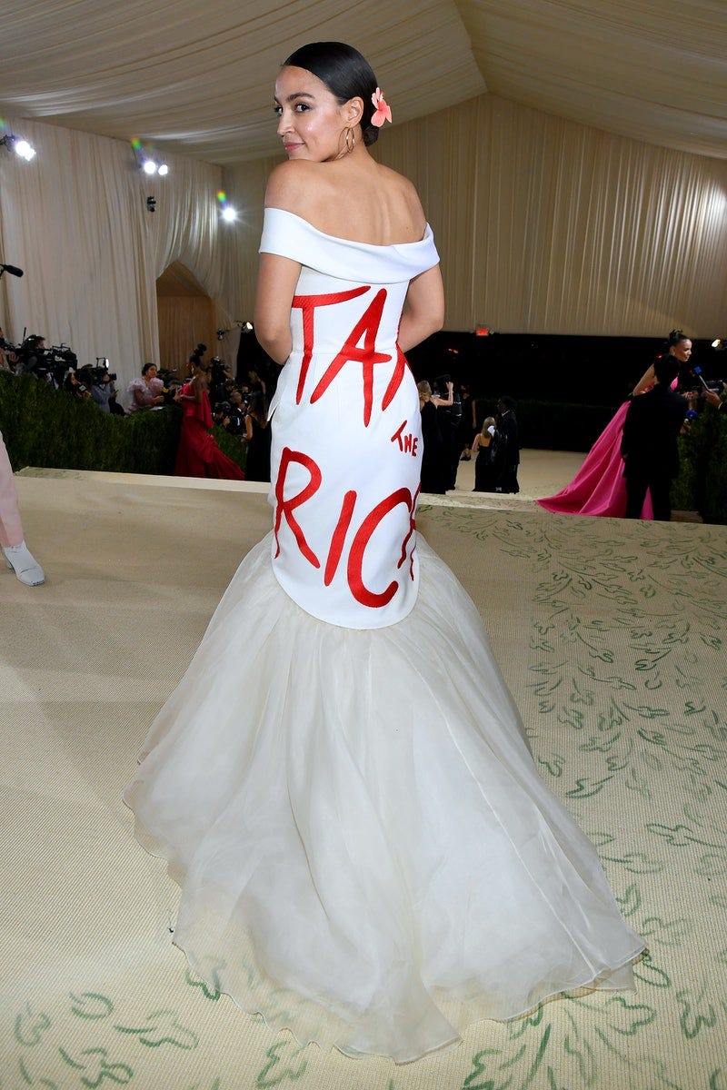 AOC&#39;s Met Gala 2021 Look Reads &quot;Tax The Rich&quot;