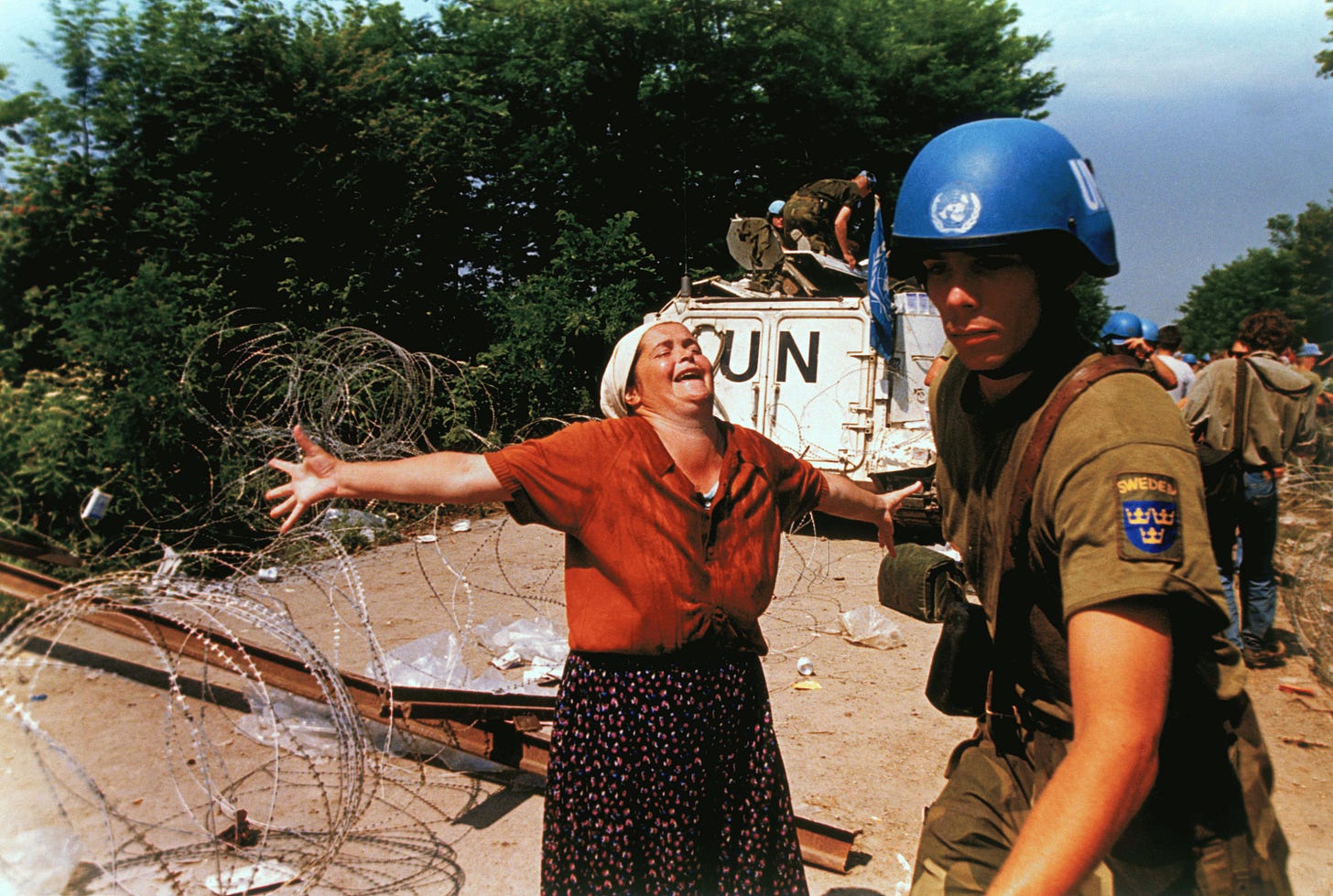 UN Troops and distressed civilians during the Bosnia Genocide