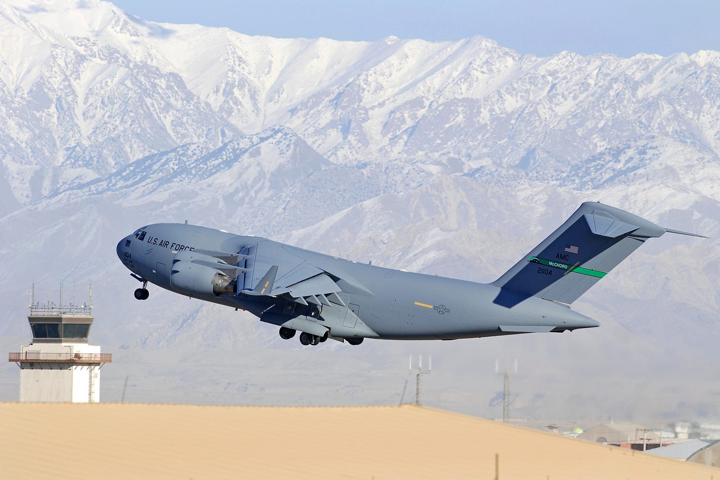 A U.S. Air Force C-17 Globemaster III aircraft takes off during a daytime  mission from