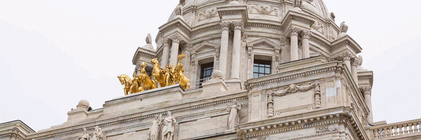 Minnesota State Capitol dome and Quadriga golden sculpture.